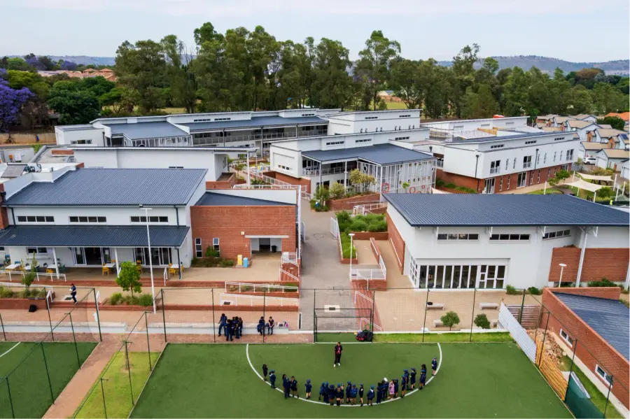 An aerial view of the Skye College campus in Honeydew Ridge, with the field and classroom blocks